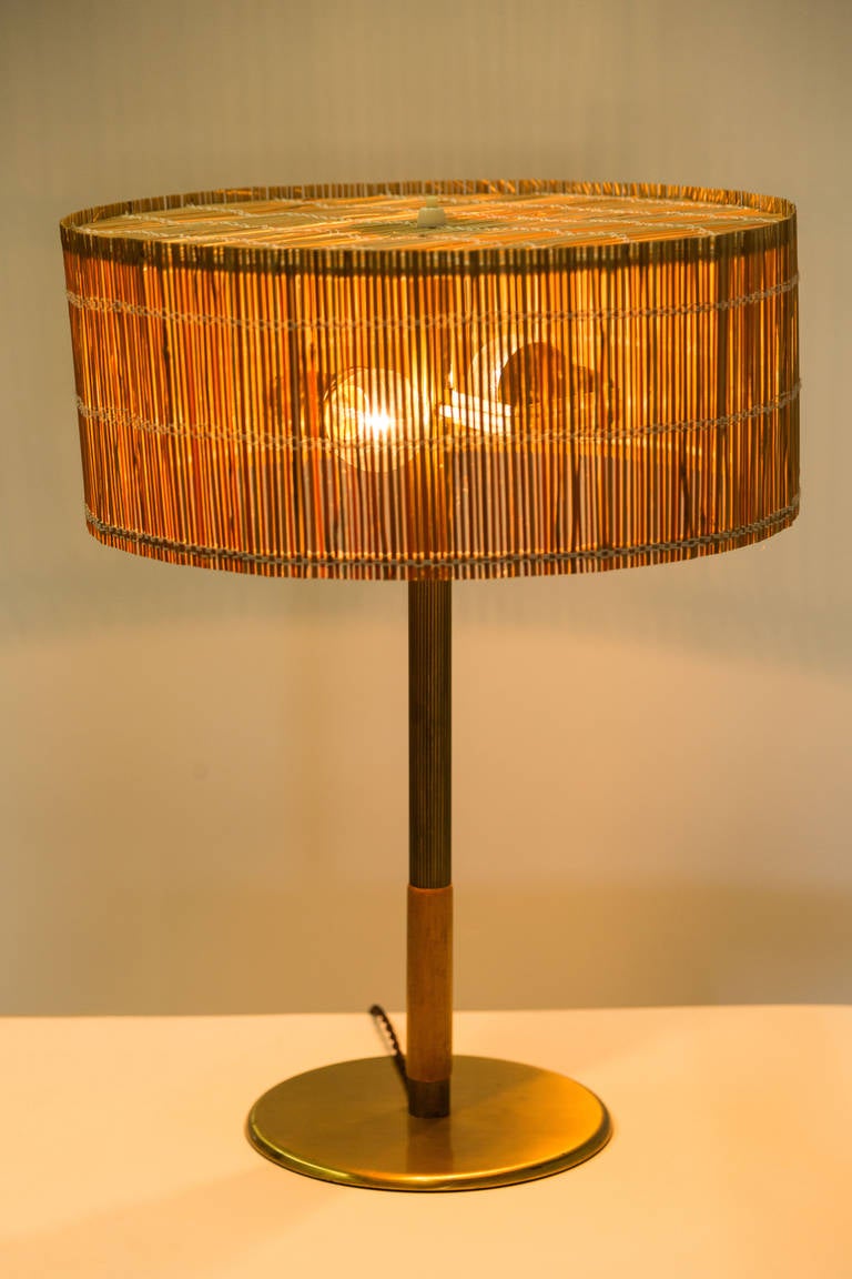 Table lamp with 
wood shade made of splints