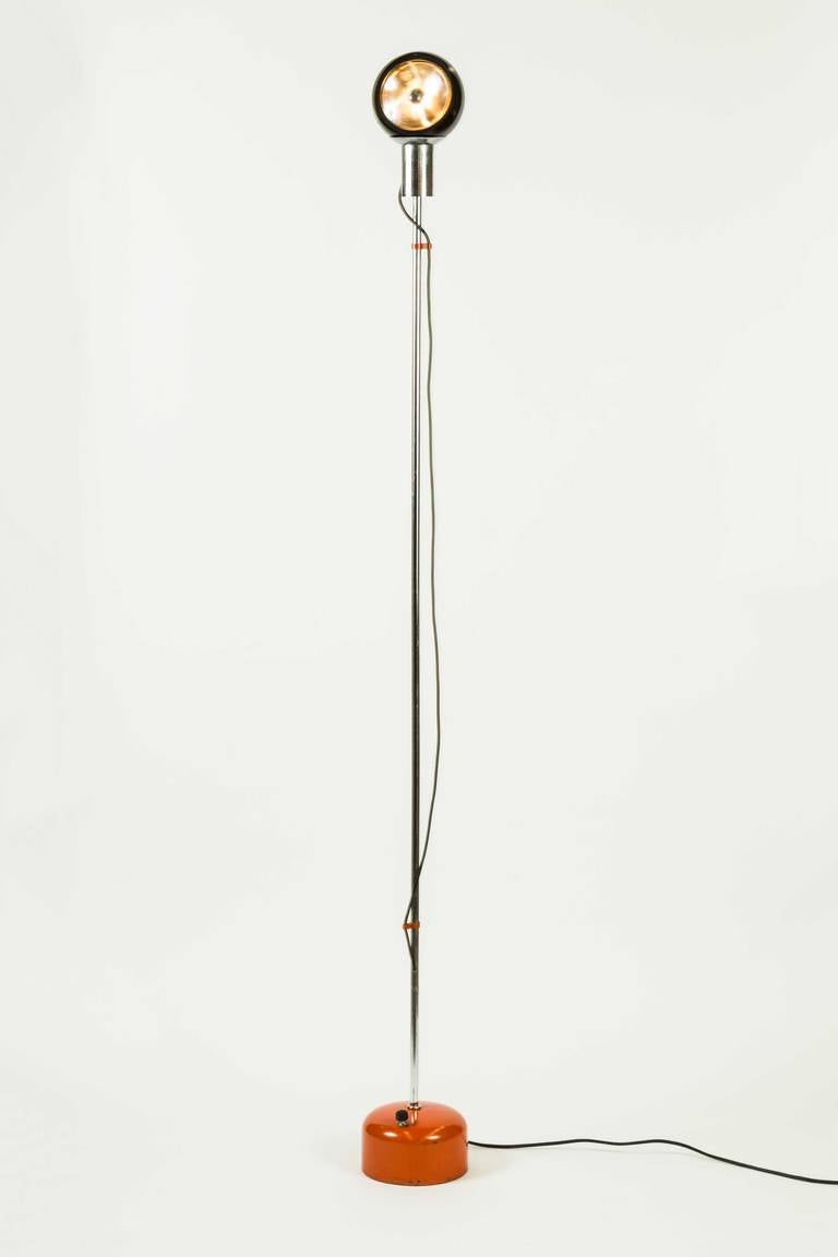 Floor lamp with a magnetized adjustable head designed by Arredoluce in Italy circa 1960s.Original cord.Takes one E27 100w maximum bulb
