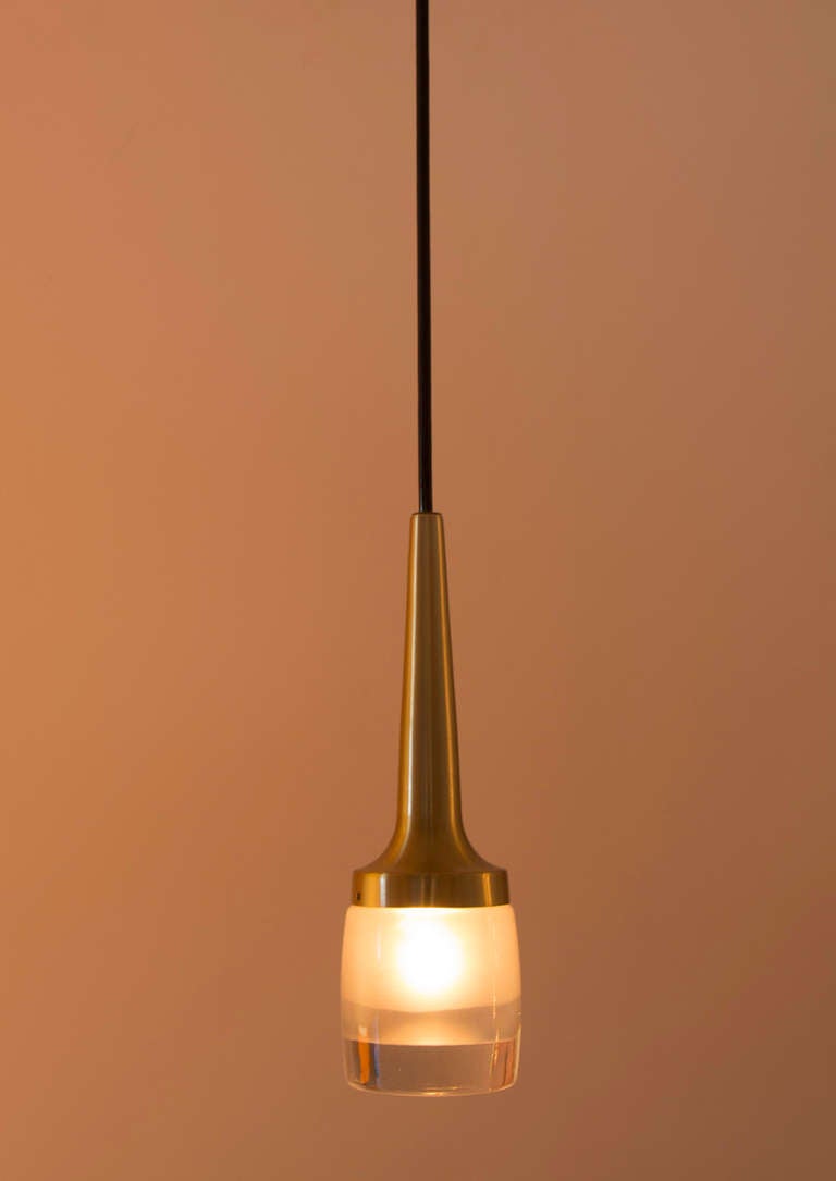 German staff pendants with mold blown glass diffuser.