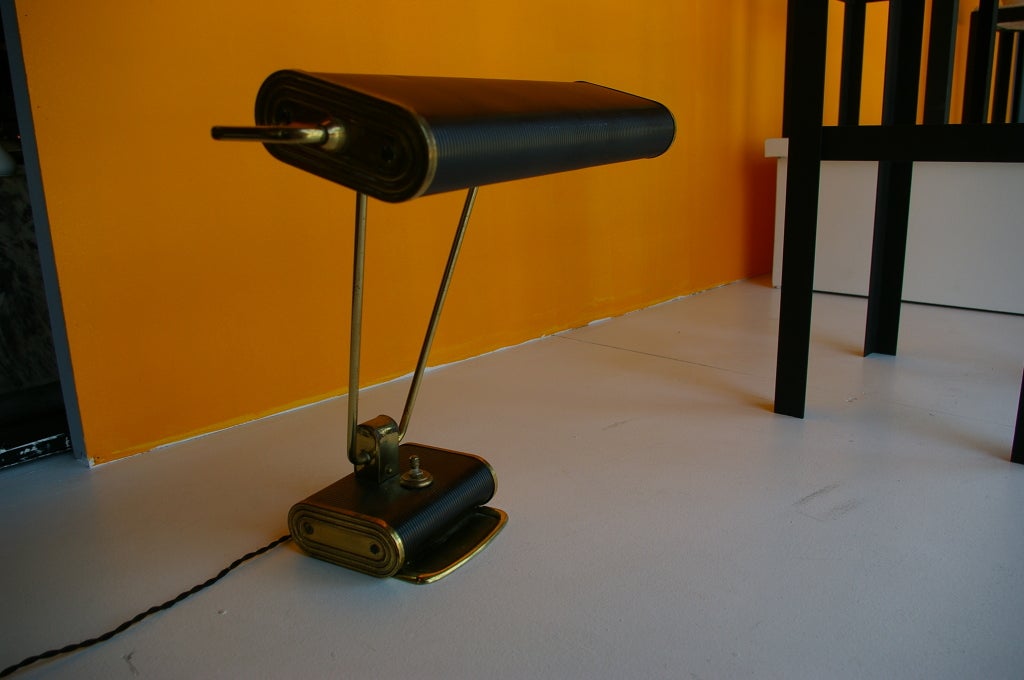 This desk lamp has been designed by Eileen Gray and made by JUMO in 1930