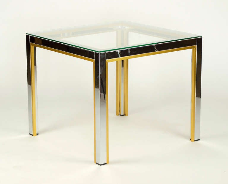 Renato Zevi side table.
Chrome and brass frame with a glass top
We also have two companion pieces of this design