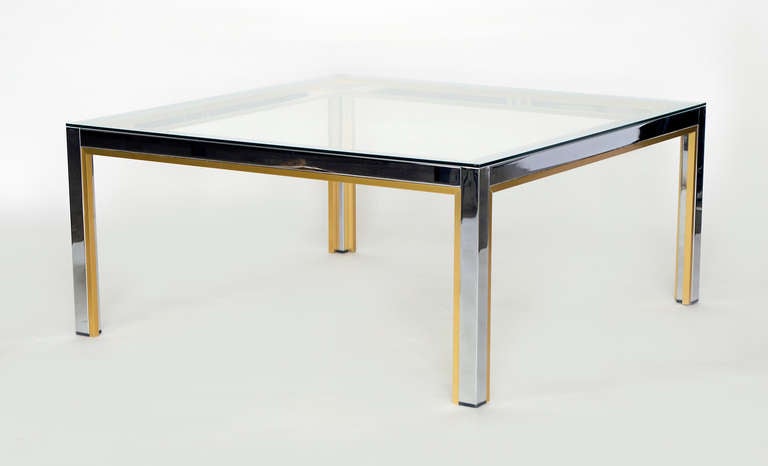 Renato Zevi coffee table.
Chrome and brass frame with a glass top
We also have two companion pieces of this design