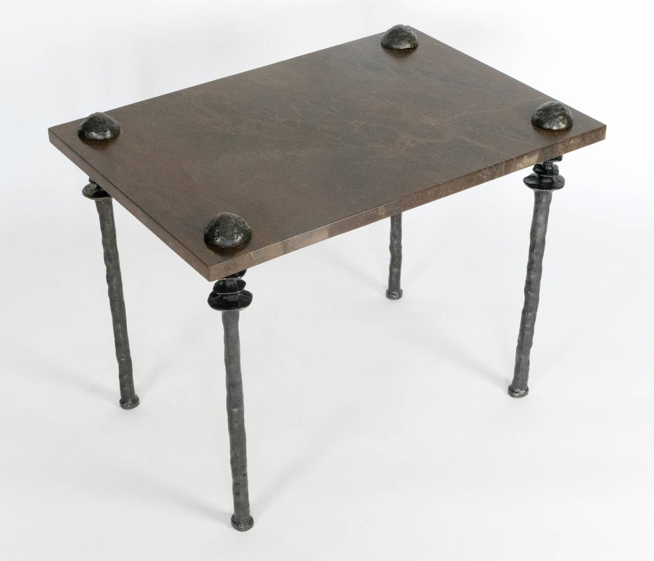 Two side tables with cast bronze legs and marble tops.