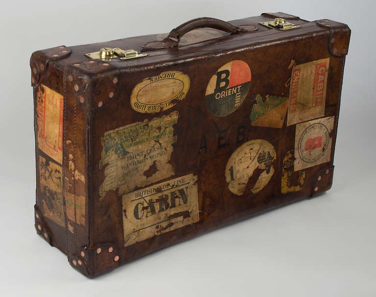 This well traveled suitcase dates back to the 1890's.  The history of the piece is obvious as you can see from the ocean liners stickers.  The case is created entirely in leather and is in perfect condition.  The latches work perfectly.