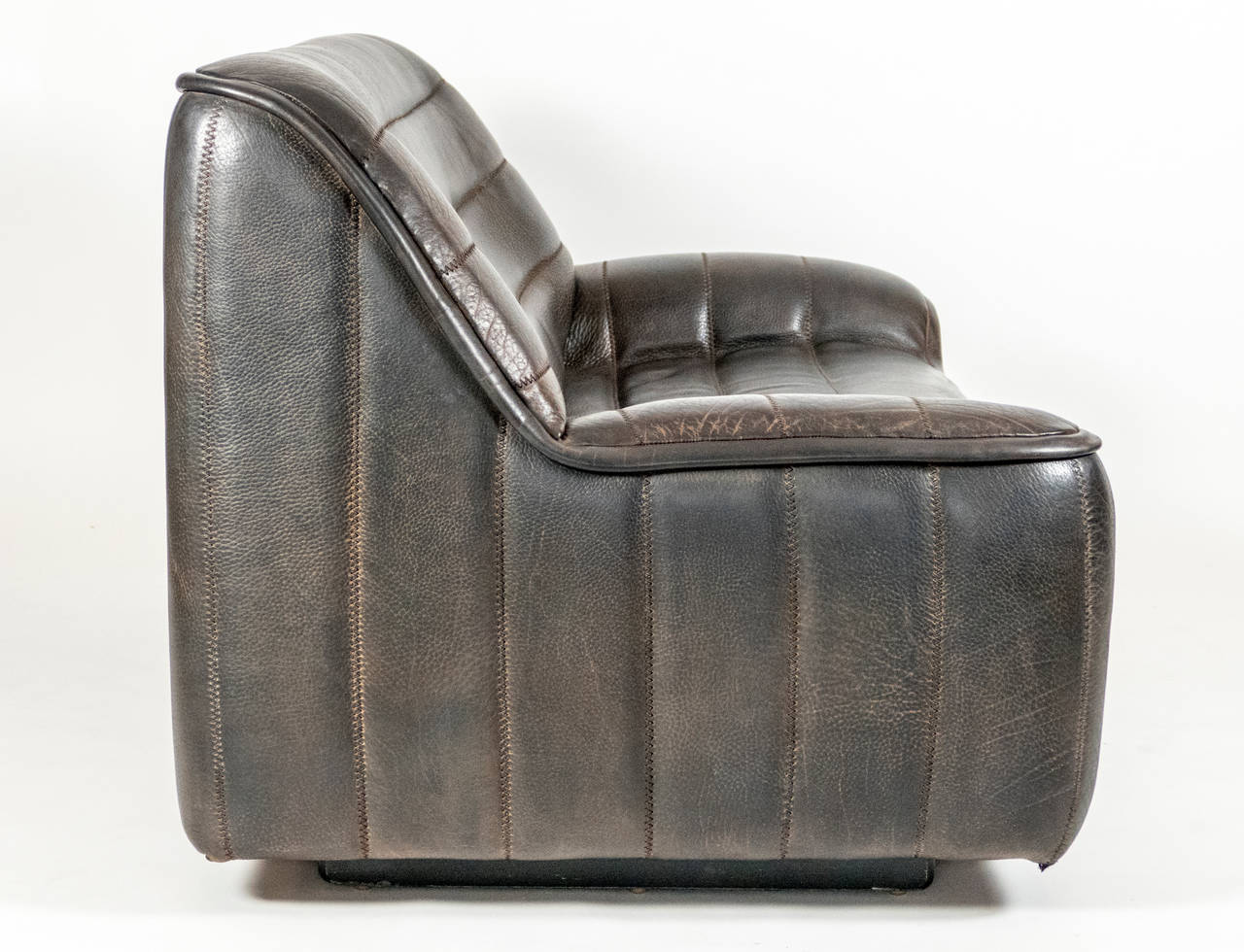 Great Patina on this quilted leather love seat.  Very comfortable and in great condition.
