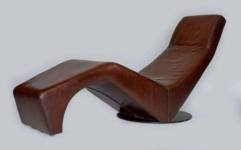 Leather design chaise lounge designed by Enzo Berti.  Manufactured in Italy by Ferlea.  The chaise lounge has very modern lines and is extremely comfortable.  It was designed in 1999 and is no longer in production.  These chairs came from the