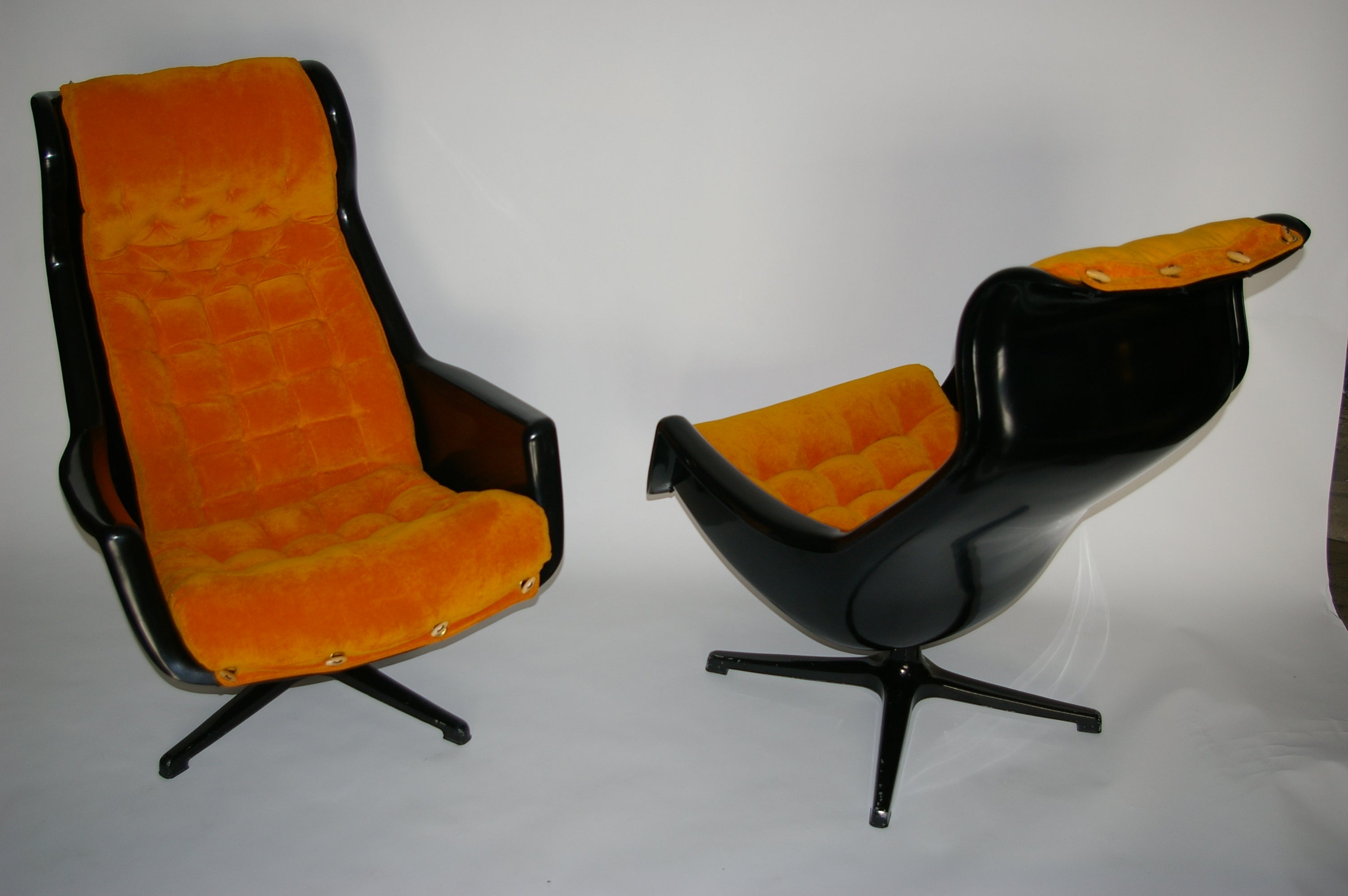 Beautiful pair of swivel Galaxy chairs