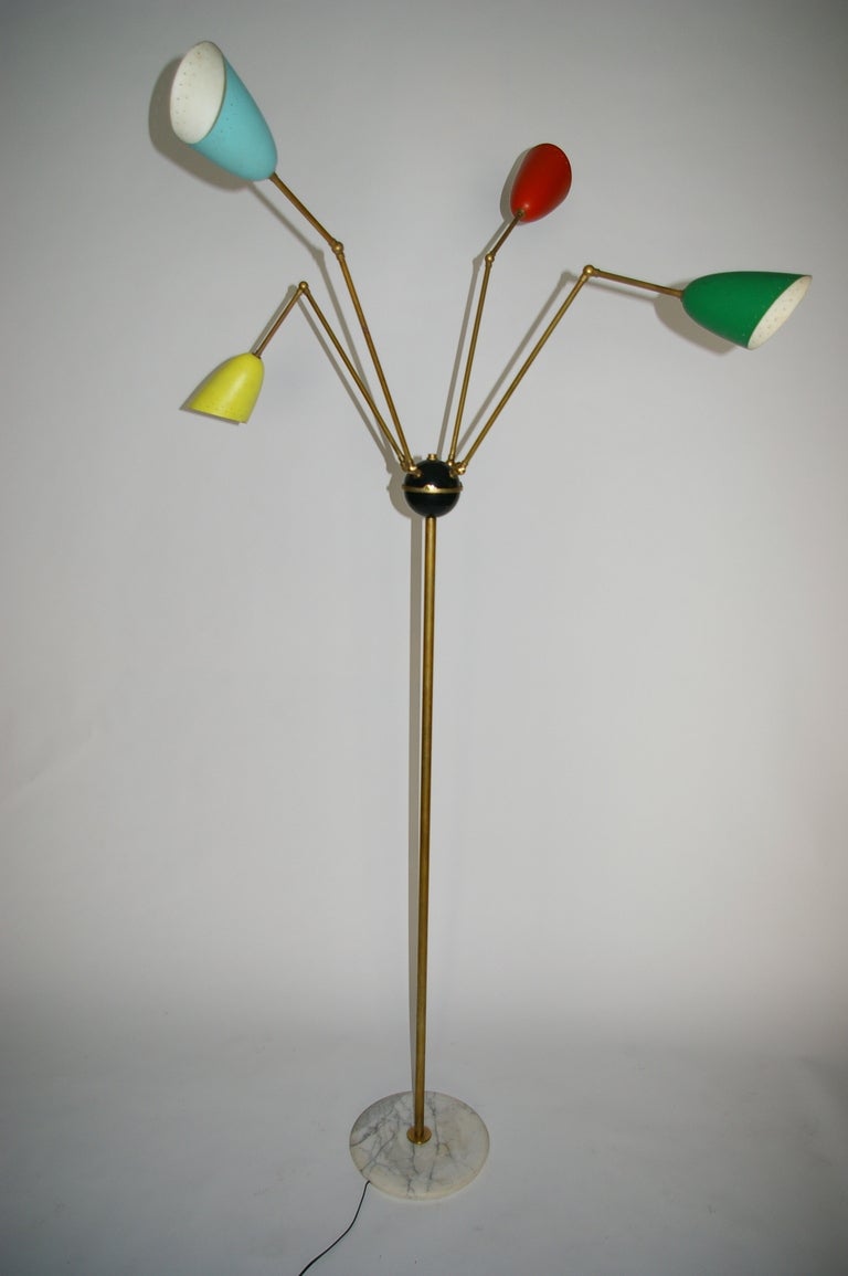 4 arms Articulated floor lamp.
Marble base and brass frame
Light is in our space in the NY Design Center.