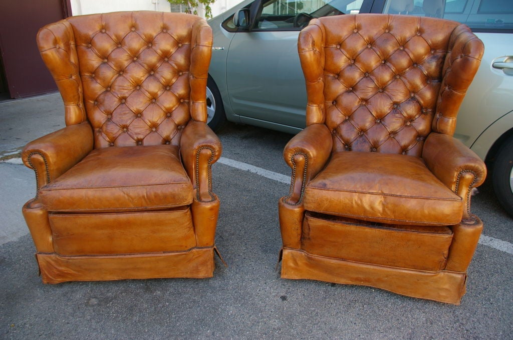 Rare original 1920's wingback chairs, incredible leather patina.   (Chairs are in 1STDIBS@NYDC Showroom, NYC.)