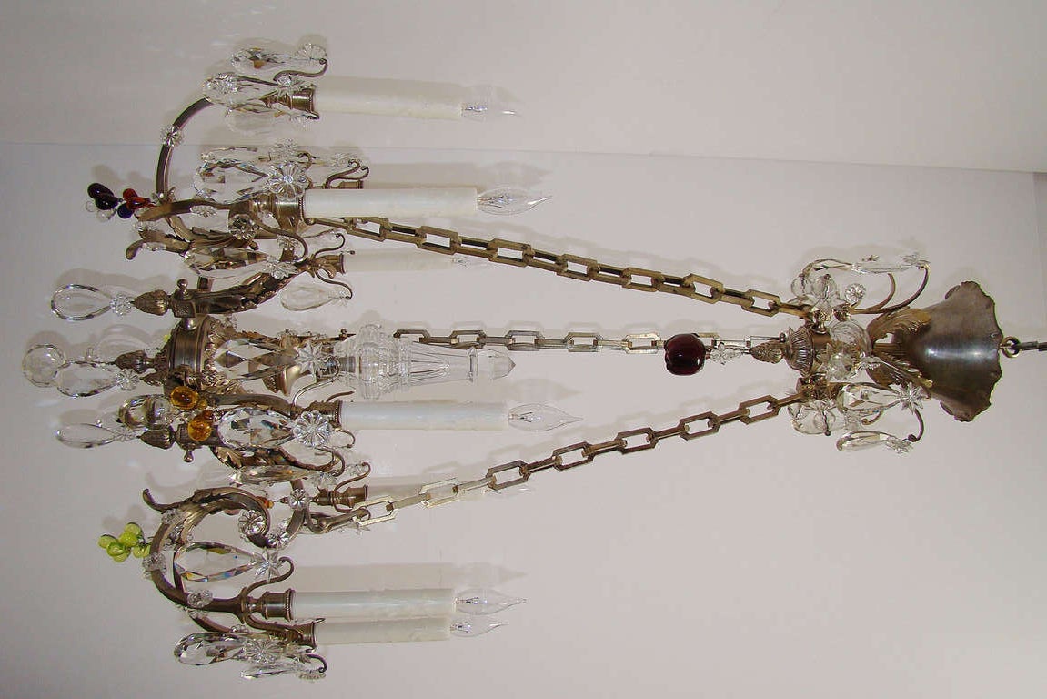 French silver over bronze crystal chandelier.