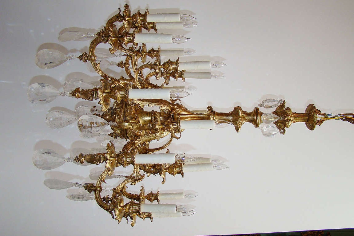 Very fine French rock crystal and bronze dore 18 light Louis XV style chandelier. Circa 1880. Originally gas.