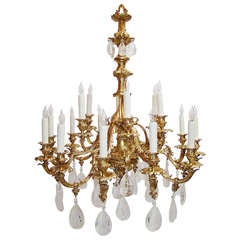 Very fine French rock crystal and bronze dore 18 light Louis XV style chandelier