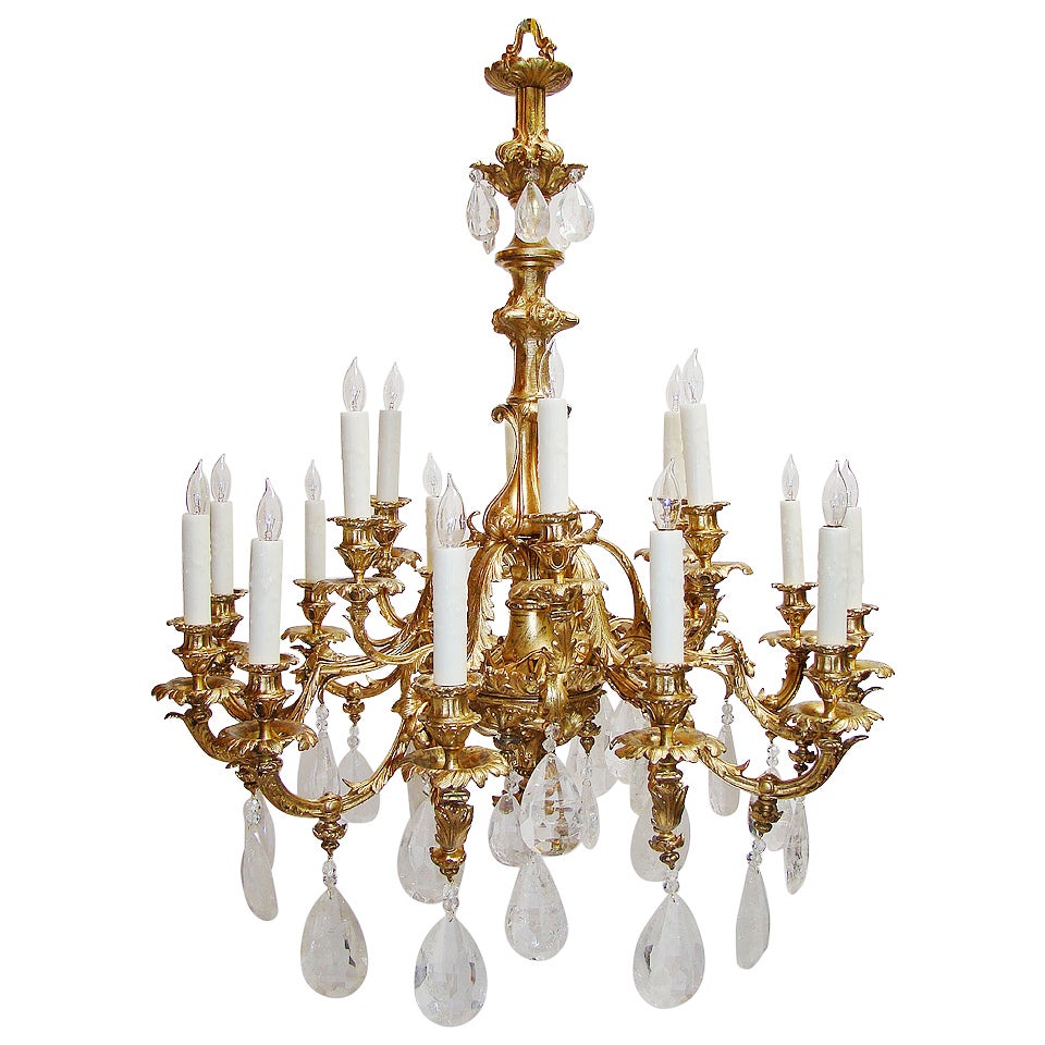 Very fine French rock crystal and bronze dore 18 light Louis XV style chandelier For Sale