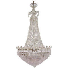 French Palladian tear drop Baccarat crystal chandelier with multi-faceted swags.