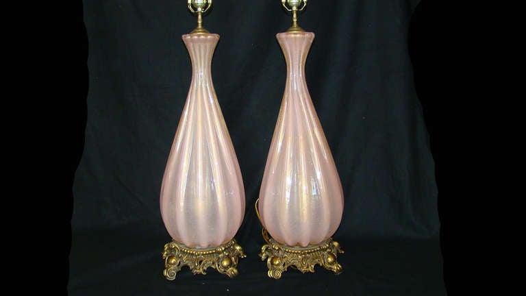 Pair of exceptional 1960’s pink murano lamps infused with gold.
