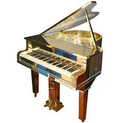 Used Custom mirrored electric piano with complete bar inside. Circa 1970