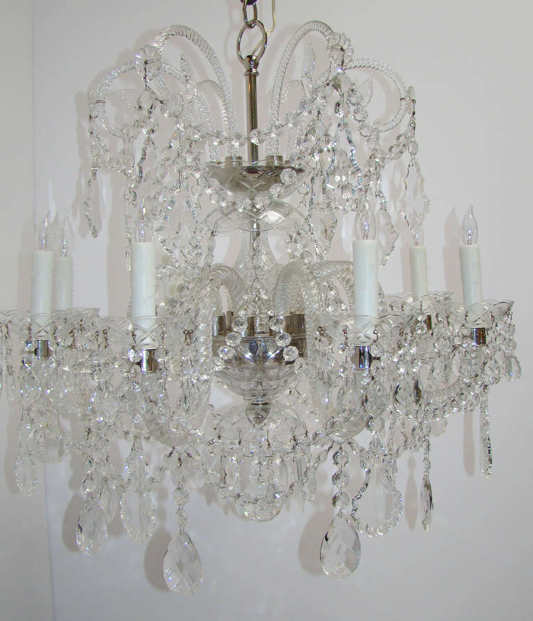 Fine English swagged crystal chandelier with twisted arms and 8 candlelight's.