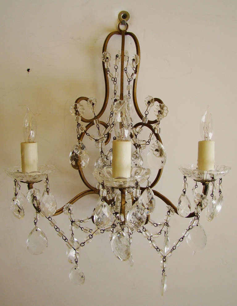Pair of Italian 3-light sconces with faceted teardrop crystals and swags.