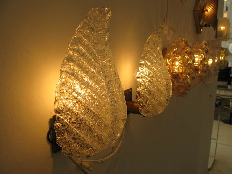 Beautiful pair of Barovier & Toso leaf shaped sconces with tiny bubbles infused into the glass.

*** ON SALE.  60% off list price until OCTOBER 3, 2014.  The price shown already reflects the 60% discount ***