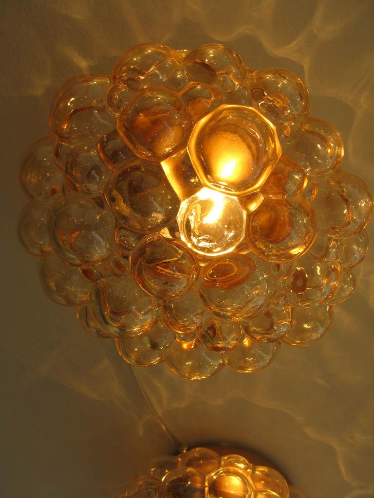 Pair of Round Bubbled Amber Glass Sconces