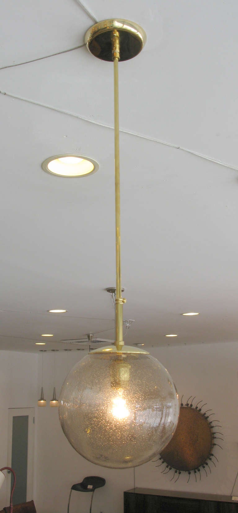 Glass ceiling pendant by Doria of Germany. Bronze hued bubbled glass with polished brass hardware.