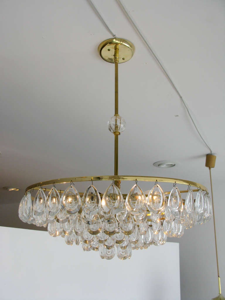 Gorgeous tiered glass & brass chandelier by Palwa of Germany.  Crystal detail on rod.  Polished brass hardware.