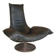 Montis Leather & Rattan Swivel Chair