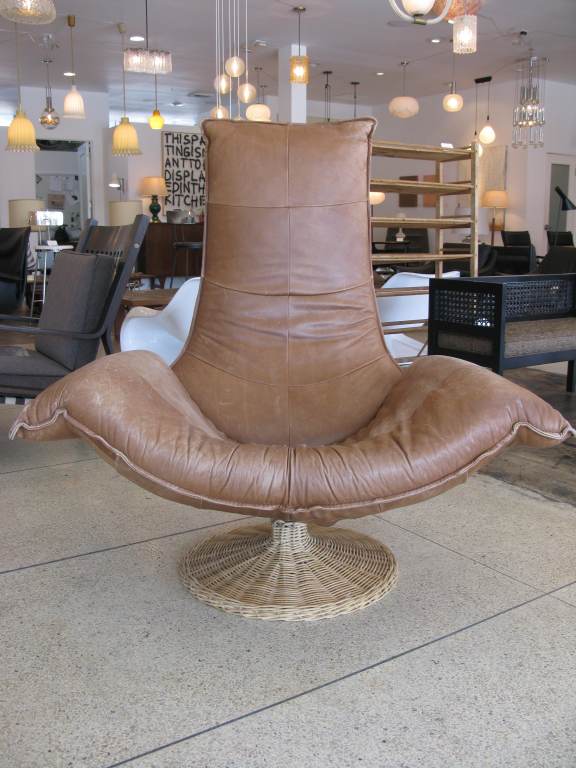 Montis Leather & Rattan Swivel Chair
