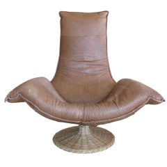 Montis Leather & Rattan Swivel Chair