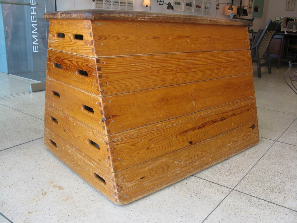 Vintage adjustable height gym vault.  Constructed of pine with dovetail joinery and beautifully aged suede top.  This multi-use vault divides into 5 stackable levels and can be used as a bench, a table, as a unique decorative piece, or for storage. 