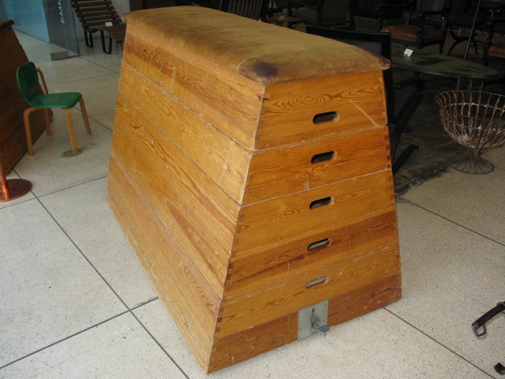 Vintage adjustable height gym vault. Constructed of pine with dovetail joinery and beautifully aged suede top. This multi-use vault divides into 6 stackable levels and can be used as a bench, a table, as a unique decorative piece, or for storage.