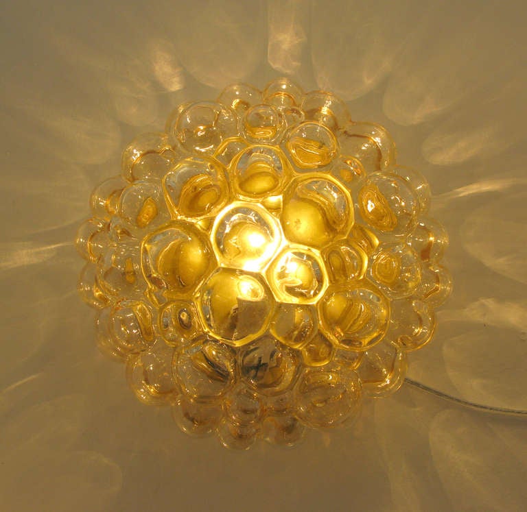 Pair of Round Bubbled Amber Glass Sconces