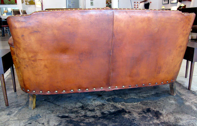 Aged Leather 2 Person Sofa In Distressed Condition In Los Angeles, CA
