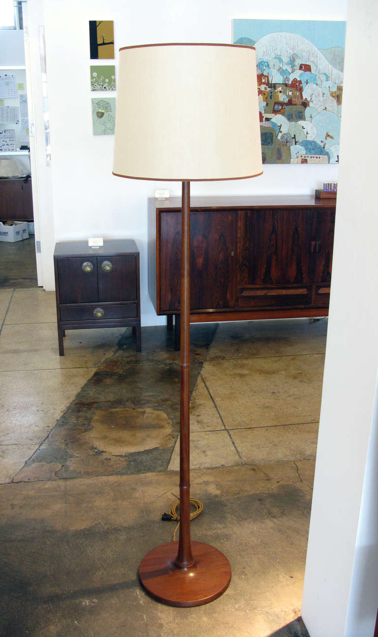 Mahogany floor lamp designed by Esben Klint for Le Klint.  New silk shade with double brown trim.  Shade measures 15.25