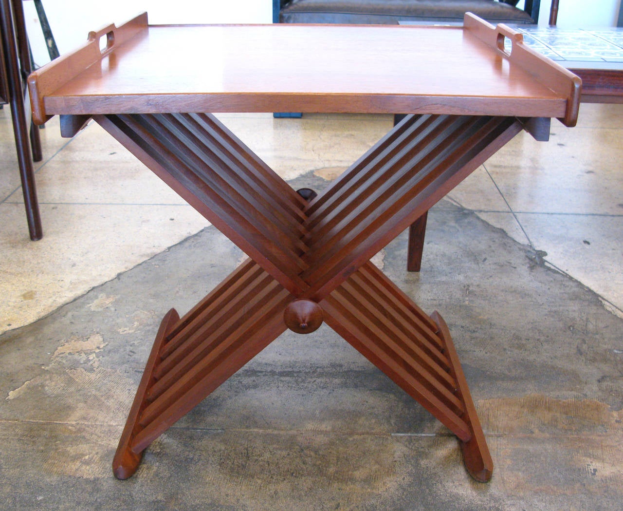 Designed by Kipp Stewart and Stuart MacDougall for the Drexel Declaration Line, circa 1960. The removable tray sits on top of the folding base and is stamped on the underside. Tray surface measures 19.5