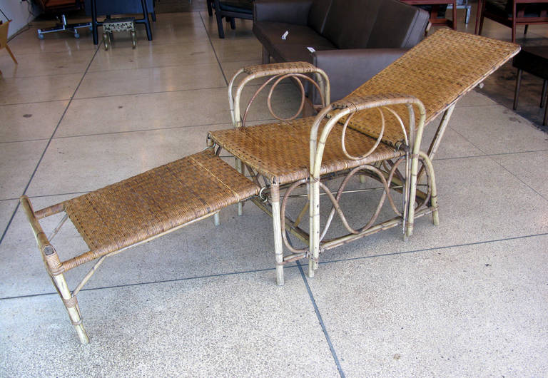 Adjustable wicker lounger by Robert Wengler.  Converts from chair to lounger (back reclines in 5 positions).  Measures 71.5