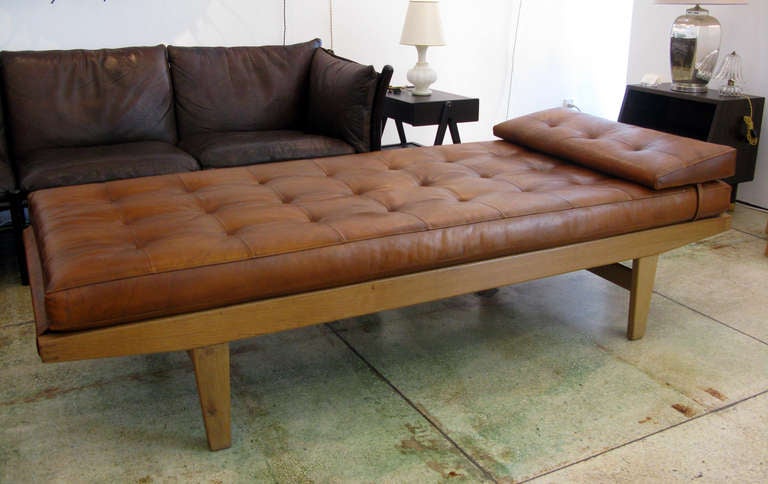Birch and teak daybed by Poul Volther.  Beautifully aged tufted cognac leather cushion with matching leather wedge pillow.
