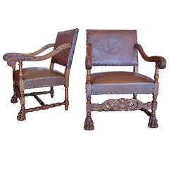 Pair of Aged Leather & Wood Armchairs