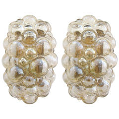 Pair of Oval Bubbled Amber Glass Sconces