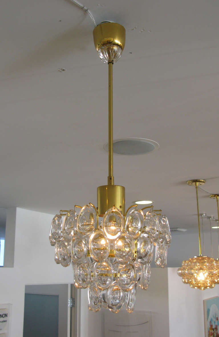 Stunning petite crystal chandelier by Gaetano Sciolari.  Crystal detail at canopy.  Polished brass hardware.  Height of glass portion alone is approx 8.5