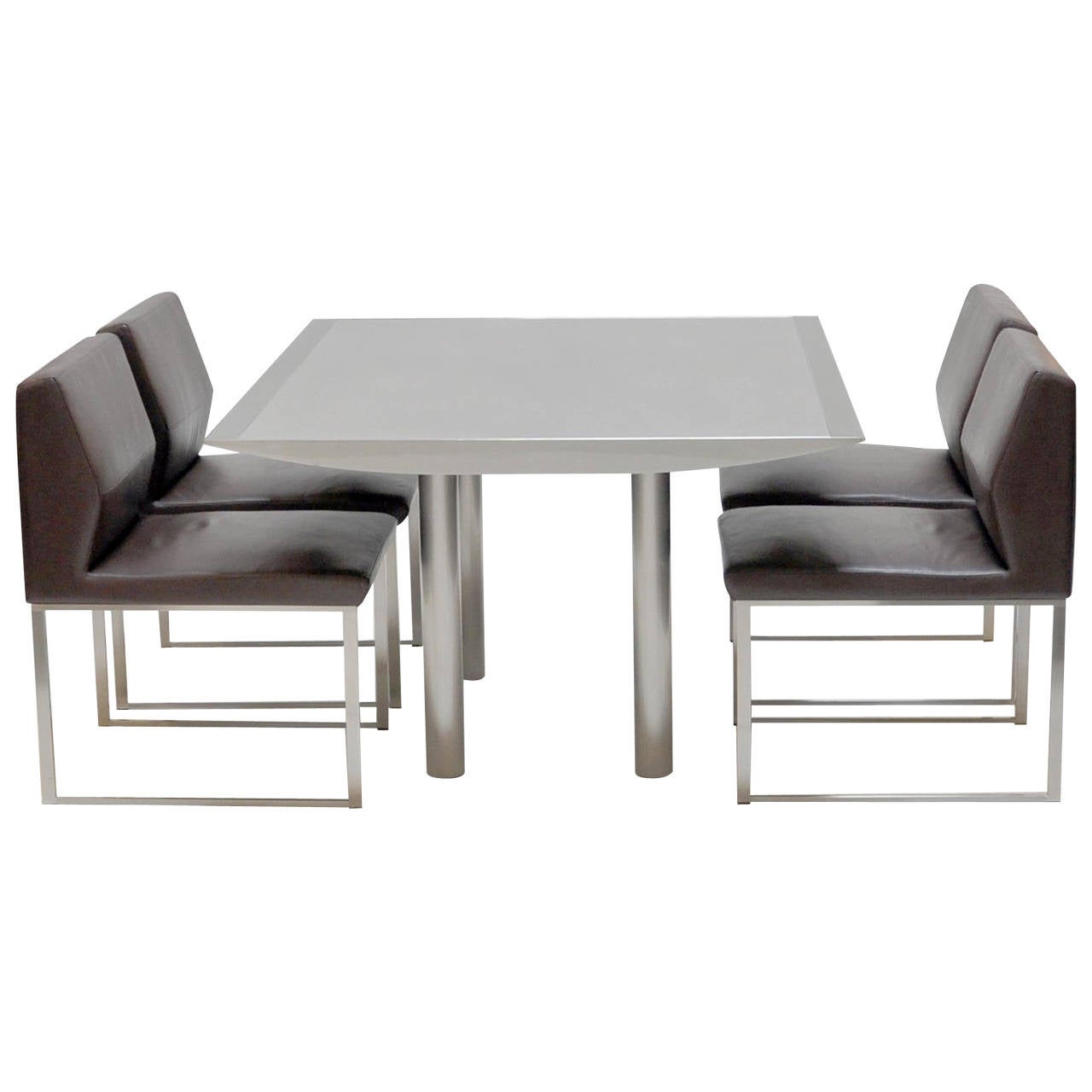 Stainless Steel Table with Four Leather and Steel Chairs For Sale at