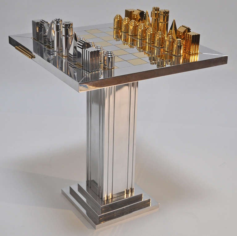 Outstanding 1970s Polished Aluminum and Brass Chess Table and Pieces.
The pieces are solid and heavy. Features two slide out trays.
Top quality design and craftsmanship.
Price is for the table and chess pieces.
