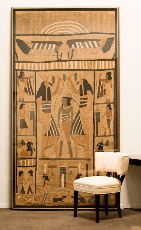 Large scale framed late 19th century Egyptian Tapestry. (one of pair) Panel is made up of hand stitched cotton appliques. Professionally mounted with space between tapestry and acrylic face.<br />
Price is for one tapestry. Two available.