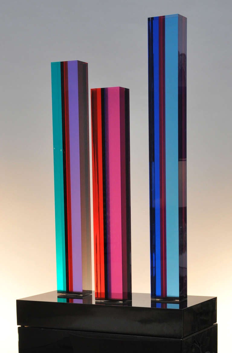 Signed (Vasa 1987) multicolored acrylic sculpture by Vasa Mihich. 
The colors change in appearance as you move around the sculpture. Mounted on a laminated base.
The sculpture is sitting on a black acrylic base that is not part of the sculpture.