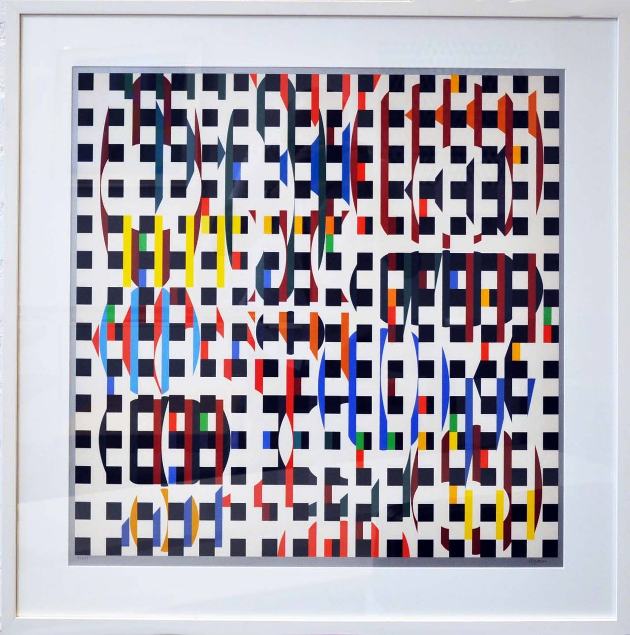 Lithograph by experimental artist Yaacov Agam (b. 1928). Hand signed and numbered 67/165.
Newly framed.