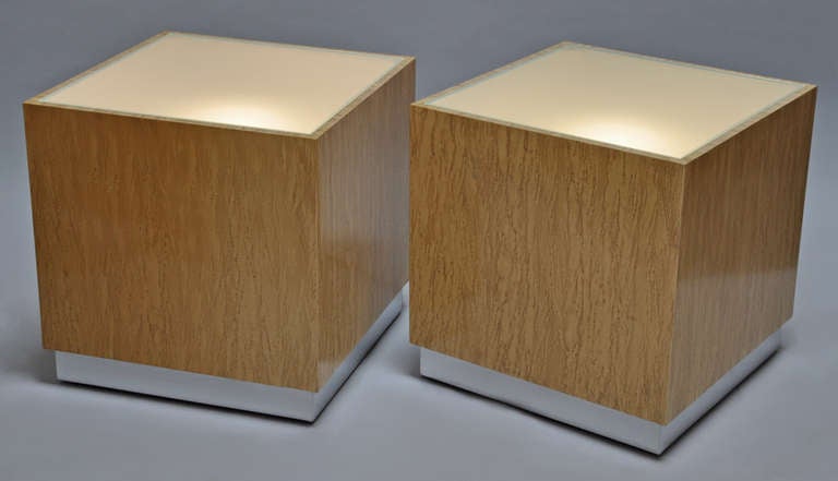 Pair of illuminated tables/nightstands designed by American designer Milo Baughman.
These tables feature polished chrome bases, wood sides, with sandblasted glass tops. The lights have dimmers
Top quality design and craftsmanship.
Price is for