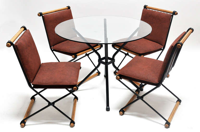 Table and four chairs, designed by acclaimed California designer, architect and landscape architect: Cleo Baldon (1927-). The table features a 38