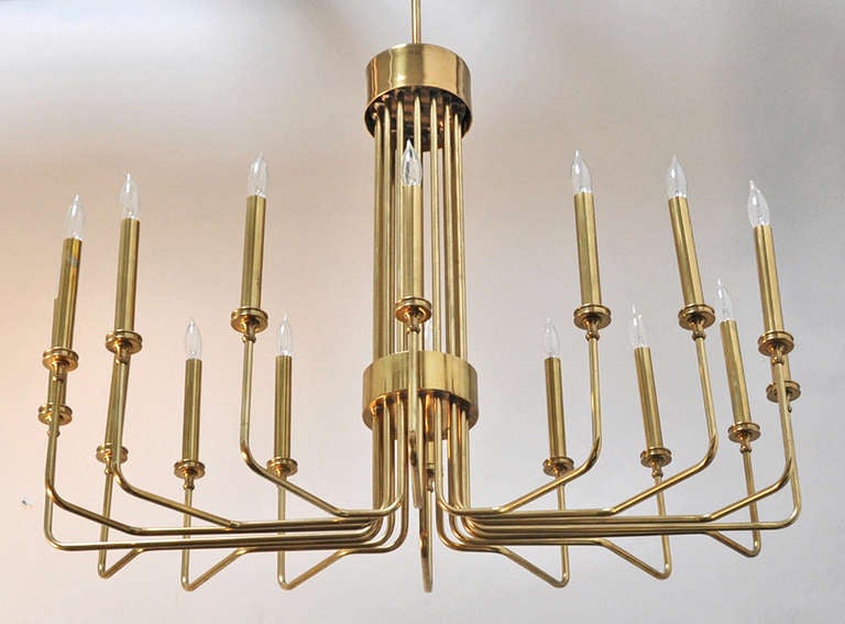 16 candle brass chandelier, circa 1950s. Top quality design and construction. This lamp is ready to hang.