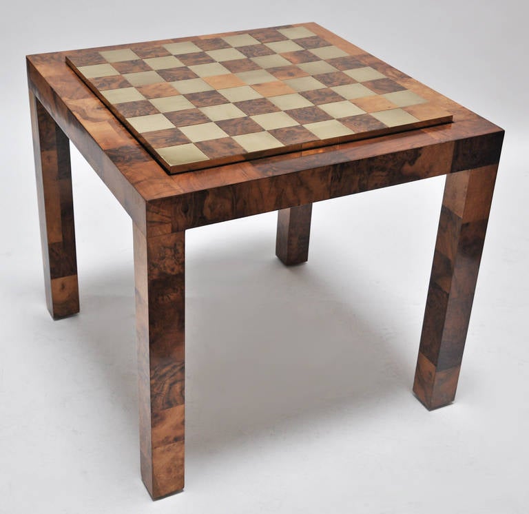 Burl wood and polished brass game table designed by Paul Evans. Game board flips over to reveal a solid black laminate.