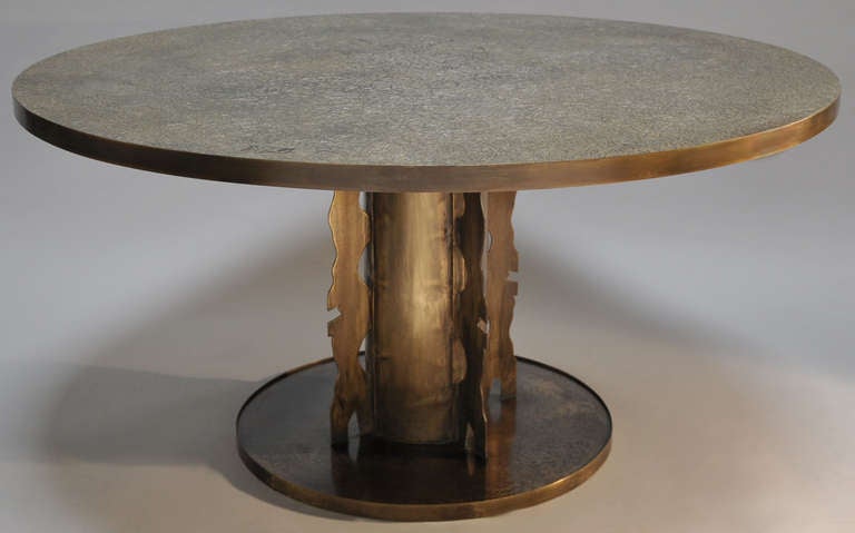 Signed center/side table by Philip and Kelvin LaVerne. Bronze with pewter overlay. The Etruscan patterned top measures 47.25